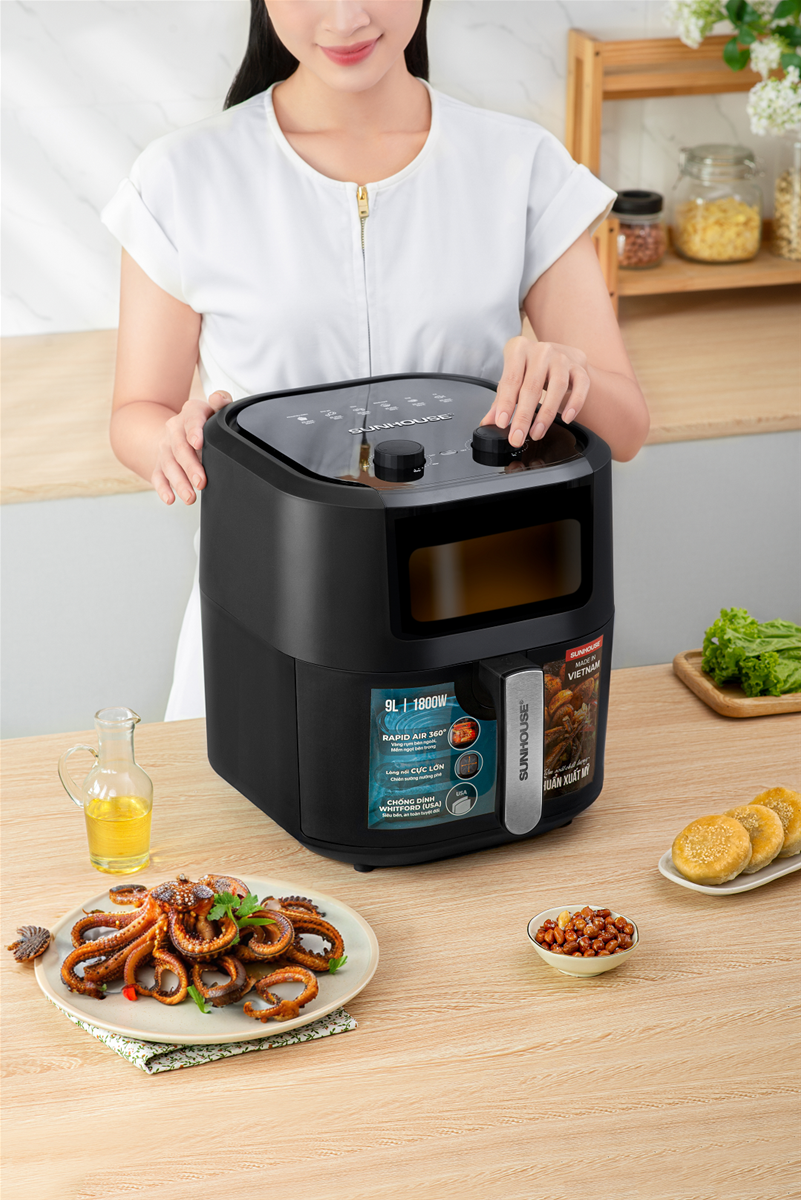 Bước chỉnh nhiệt độ và thời gian sẽ quyết định đến chất lượng món ăn khi chế biến từ nồi chiên không dầu
